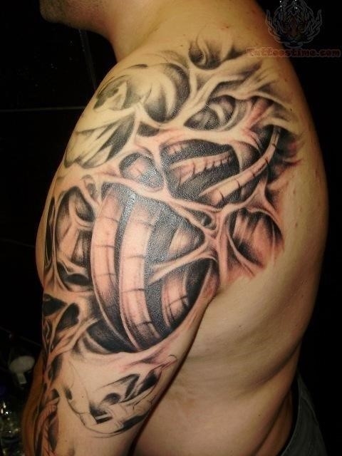 Mechanical shoulder tattoo