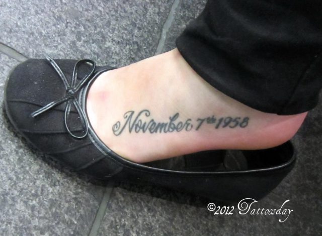 Memorable date tattoo on foot