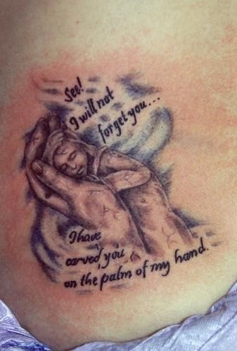 Memorial baby tattoo on side