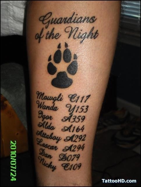 Memorial dog pawprint tattoo