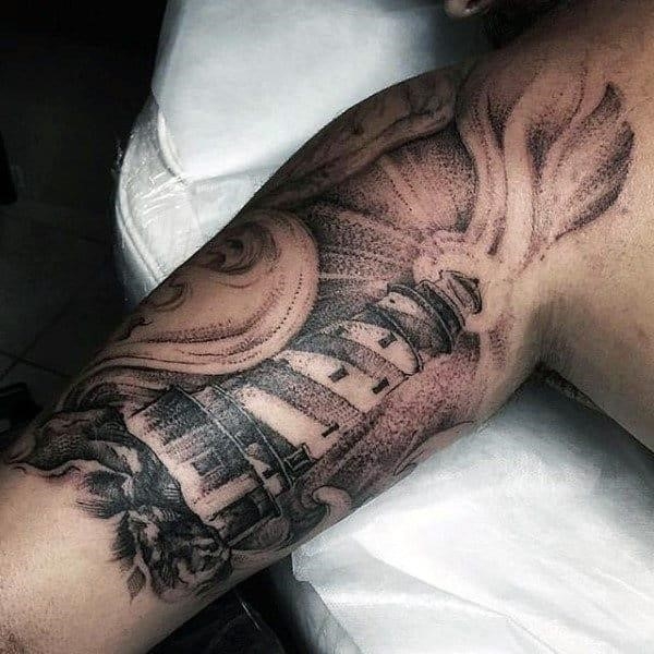Mens bicep lighthouse tattoo