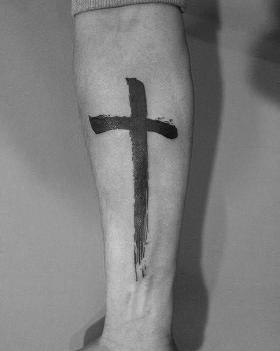 Mens inner forearm simple cross brush stroke tattoos