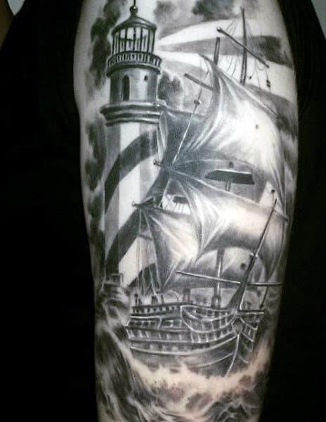 Lighthouse tattoo by Mully TattooNOW