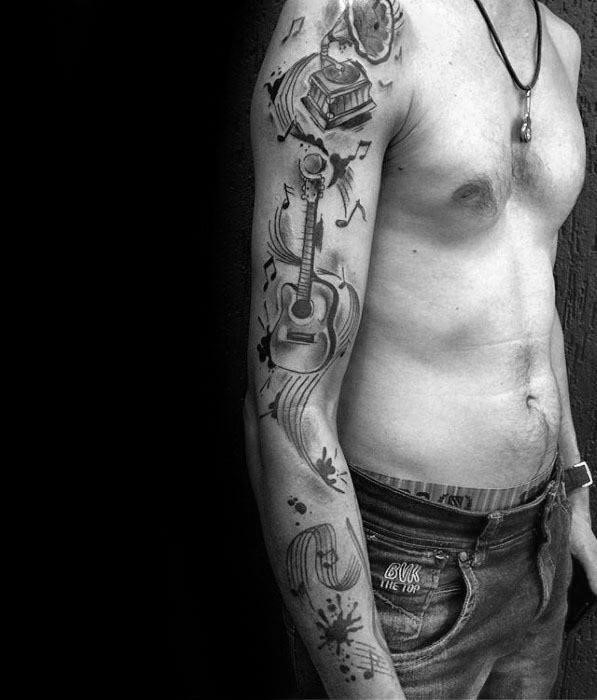 Mens music staff tattoo arm sleeve design inspiration