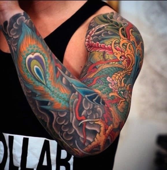 Mens phoenix sleeve tattoo