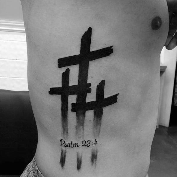 Mens rib cage side simple cross tattoo inspiration