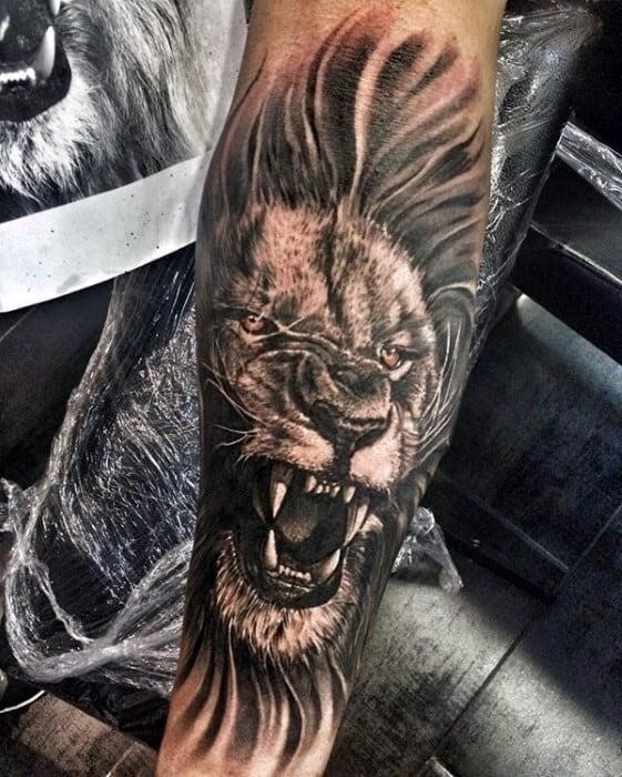 Mens roaring lion forearm tattoos
