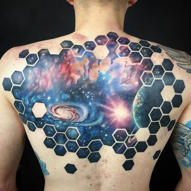 Mens space back tattoo