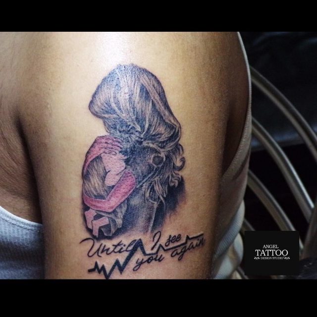 Mother baby tattoo