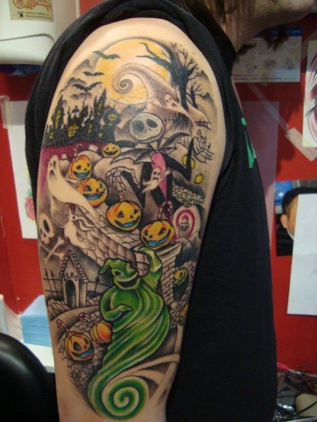 Nightmare halloween tattoo on man right half sleeve