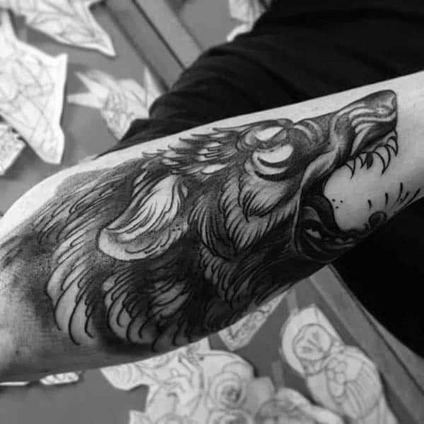 Outer forearm badass mens traditional wolf tattoo