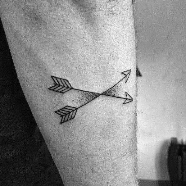 Outer forearm simple small arrow tattoo design on man