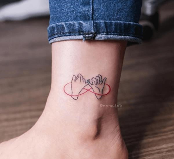 Pinky promise hands tattoo
