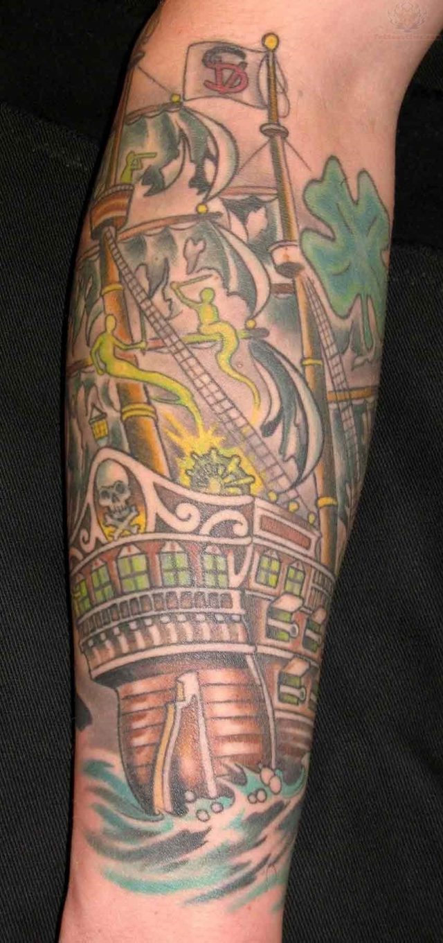 Pirate ship color ink tattoo on sleeve