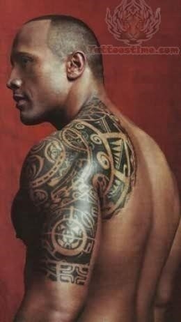 Polynesian tattoo on rock shoulder