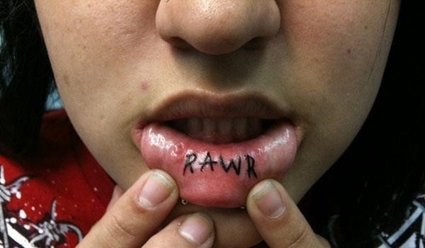 Rawr lip tattoo