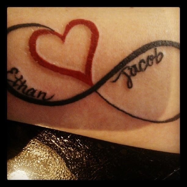 Red heart and infinity tattoo