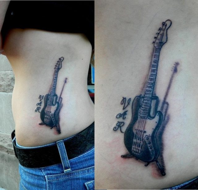 Rib side guitar tattoo