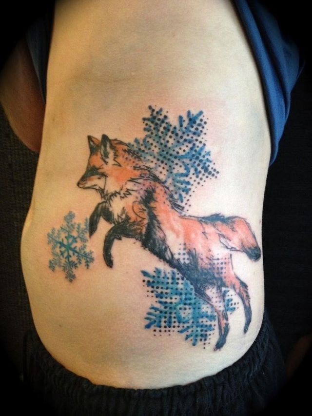 Rib side jumping fox tattoo for men