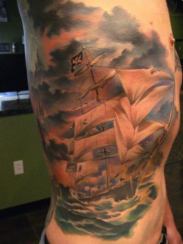 Side rib pirate ship tattoo