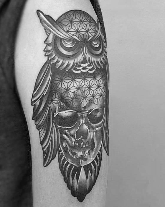 Skull with geometric owl mens arm tattoos