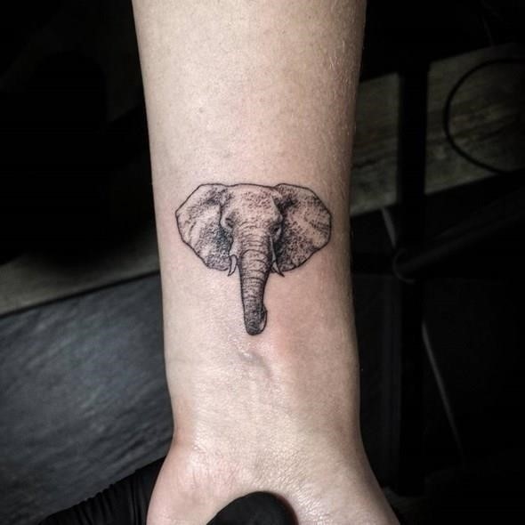 Small elephant head tattoo