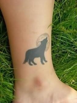 Small wolf tattoo