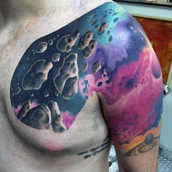 Space shoulder tattoo for men