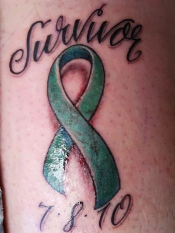 Survivor green ribbon cancer tattoo