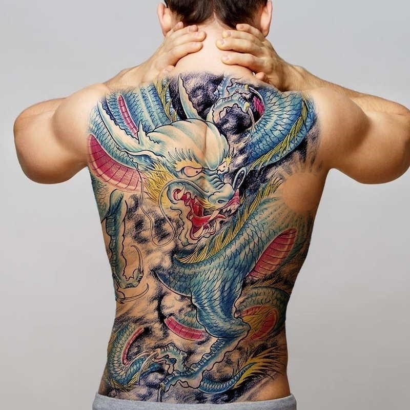 50 Cool Upper Back Tattoos for Men 2023 Inspiration Guide