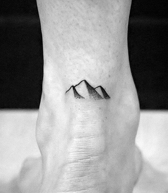 Tiny cool simple mens mountain heel tattoo