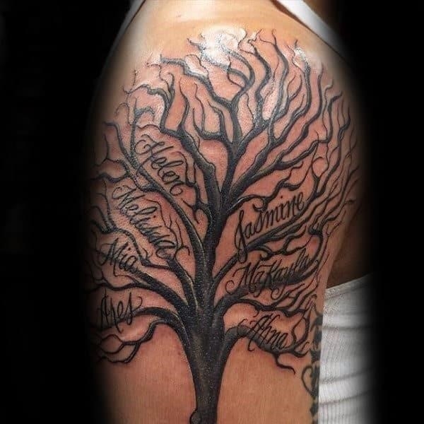 Tree branches mens family upper arm tattoo