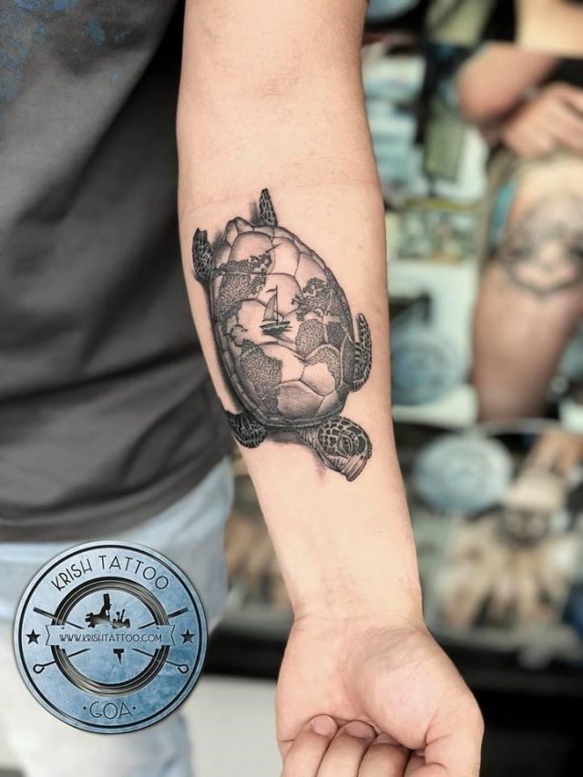 Turtle tattoo with world map