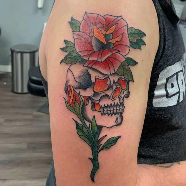 Watercolor painting skull rose tattoo